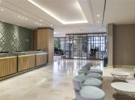 梅尔辛希尔顿酒店，位于梅尔辛的酒店