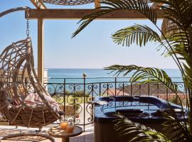 Casa Di cuore Suite Sea View - with Jacuzzi，位于阿凯松的酒店
