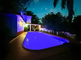 Loft para 4 en casa de huespedes con alberca comun