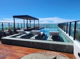 Flat a 50 metros da praia + piscina e área gourmet