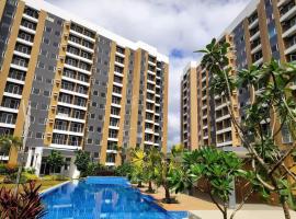 1 BR Taytay HIVE Condo WIFI Netflix Pool Patio，位于Taytay的酒店