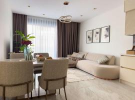 Qoople Legend C - apartments in Alanya 100m to the sea，位于阿拉尼亚的带热水浴缸的酒店