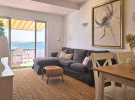 Beach House on Faro Island with a Dreamy Terrace and 7 Beds for the Perfect Escape，位于法鲁的酒店