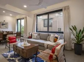 SaffronStays Fira - 4BR villa with pool, lift & sea breeze near Candolim, Baga & Reis Magos Fort