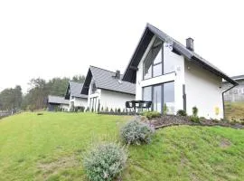 Cottage by Kiedrowickie Lake with Boat Access
