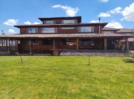 Centro de Aclimatizacion La Casa de Simon Lodge，位于Toacazo的木屋