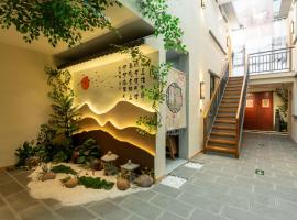 Floral Hotel Dongmoshang B&B, Lijingmen Cross Street, Luoyi Ancient City，位于洛阳的酒店