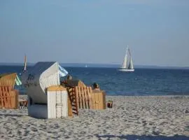 With beach chair & sea