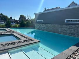 Condos Vacances MSA 2CH - incluant piscine et spas extérieurs OUVERTS À L'ANNÉE!，位于博普雷的酒店