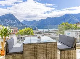 Imperial of Lugano 2 with a lake view and garden behind the station and 10 min from the lake of Lugano