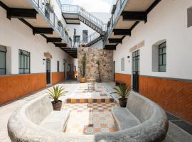 Casa 212 con WIFI alta velocidad y estacionamiento，位于普埃布拉的自助式住宿