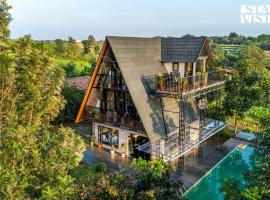 StayVista at Hillside Harmony Pvt Pool & Free Breakfast，位于班加罗尔的酒店
