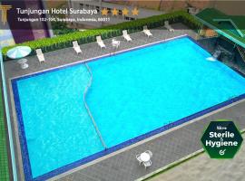 屯郡甘酒店，位于泗水的酒店