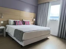 Suíte em flat no Gonzaga Stay Helbor