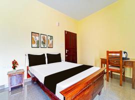 Super Hotel O Omalloor Temple Formerly MTS Lodge，位于Pathanāmthitta的酒店