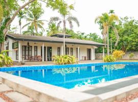 Beach Club Bungalow Induruwa，位于因都鲁瓦的酒店