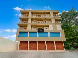 Collection O Kottayam Caritas Bus Terminal，位于戈德亚姆的酒店