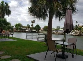 Oasis Waterfront Treasure Island Apartment with Patio Dock and Johns Pass