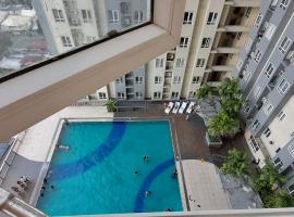 Casa Vides at Victoria Sports Tower beside GMA Kamuning MRT Station，位于马尼拉的带热水浴缸的酒店