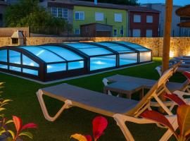 Casa El Rincón de Alberto con Piscina CLIMATIZADA y Calefacción，位于Camelle的酒店