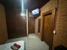 Quarto com banheiro privativo no Centro