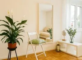 Bright furnished Studio with workspace and garden area near Zurich