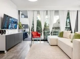 Enchanting Apartment with Pool, Steps from the Beach Bomb Shelter