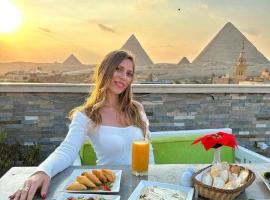 Pyramids Art View Inn，位于开罗的酒店
