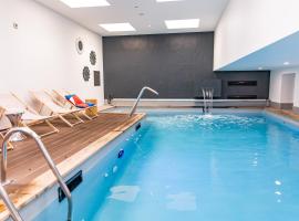Hôtel La Baie des Anges, son SPA marin & sa piscine couverte et chauffée，位于朗代达的酒店