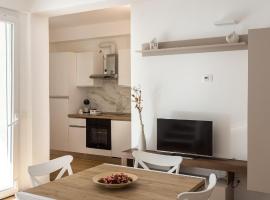 Dimora Caprera - Appartamenti，位于法尔科纳拉&middot;玛里提马的自助式住宿