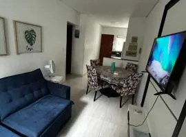 Apartamento em Condomínio Beverly Hills Praia de Vista Linda - Bertioga com Estacionamento e Piscina