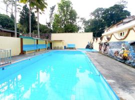 Hotel Palem Sari Syariah Batu RedPartner，位于Punten的酒店