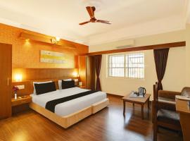 Super Townhouse Oak City Center Kushal Nagar，位于马迪凯里的低价酒店