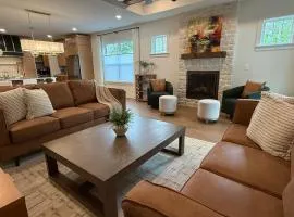 Luxury New Construction Cottage with fireplace, office, and covered deck