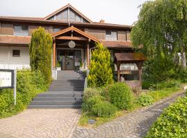 萨恩布龙嫩酒店，位于雷宁根的酒店