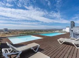Rooftop Pools & Balcony Haven by HostWise