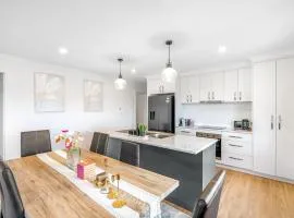 Stylish 4BR Family Escape with Deck & Views Near MONA