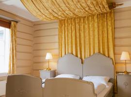 雷斯海姆酒店&汽车站，位于洛姆的浪漫度假酒店