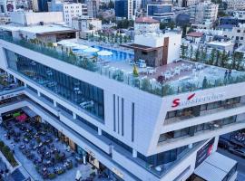 Swisstouches Hotel Amman，位于安曼的带泳池的酒店