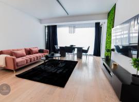 Modern 1-Bedroom Apartment with Balcony near Promenada Mall，位于Herăstrău的酒店