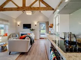 The Domini Cowshed at Village Farm