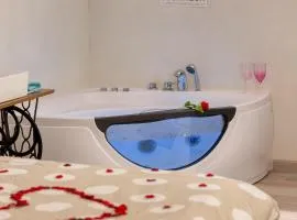 L'Escapade Enchantée - Spa, Cheminée et Cinéma