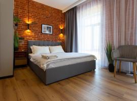 Сучасна квартира в центрі на Харківській набережній 3，位于哈尔科夫的自助式住宿