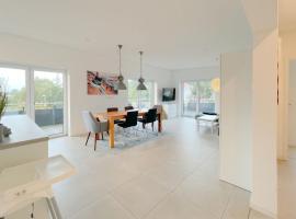 Achterwasserblick FEWO Strandstraße 21c Loddin Kölpinsee，位于洛丁的酒店