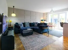 Spacious 4-Bed Home with Parking in Ness Village by Rework Accommodation