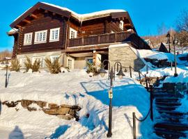 Log cabin at Hafjell，位于奥耶的酒店
