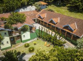 Pousada Vila Floratta by Concavus，位于坎波斯杜若尔当的酒店