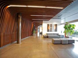 罗韦雷托纳雷克伯美居酒店，位于罗韦雷托的酒店