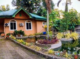 Seaside traveler's Inn by Camiguin Island Home，位于Catarman的酒店