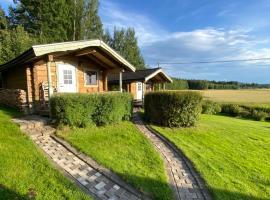 Timrad Stuga med dubbelsäng Obs i stora huset dusch toalett och kök，位于Hedemora的酒店